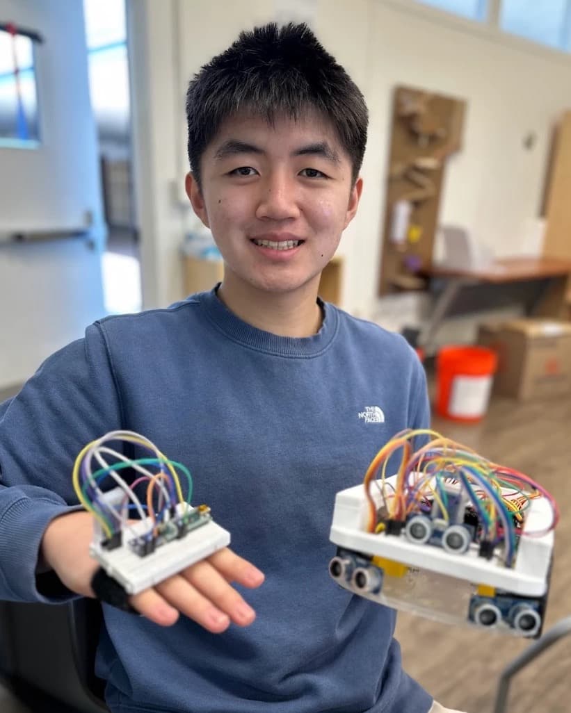 Jerry G. with their project, Gesture Controlled Robot