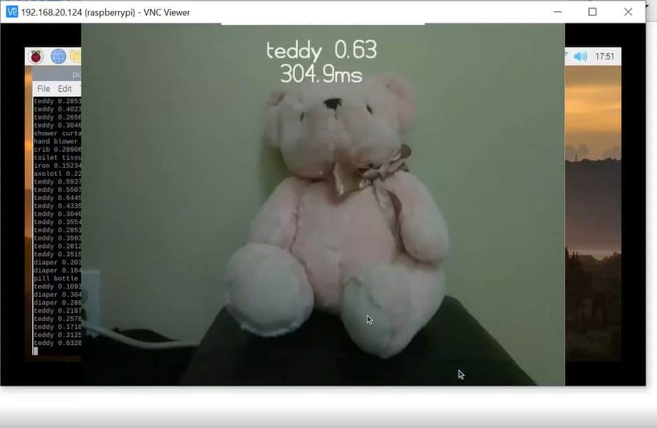 Demo when running pretrained model on the Raspberry Pi: camera preview from Pi Camera is displayed along with label from object detection model, confidence interval, and time elapsed.